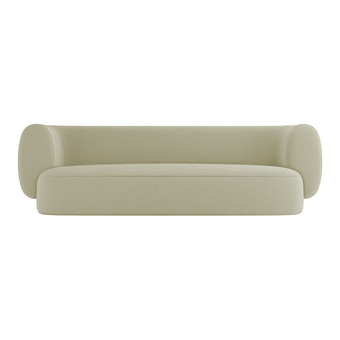 Light green minimalist sofa with rounded edges and smooth fabric finish, perfect for modern decor.