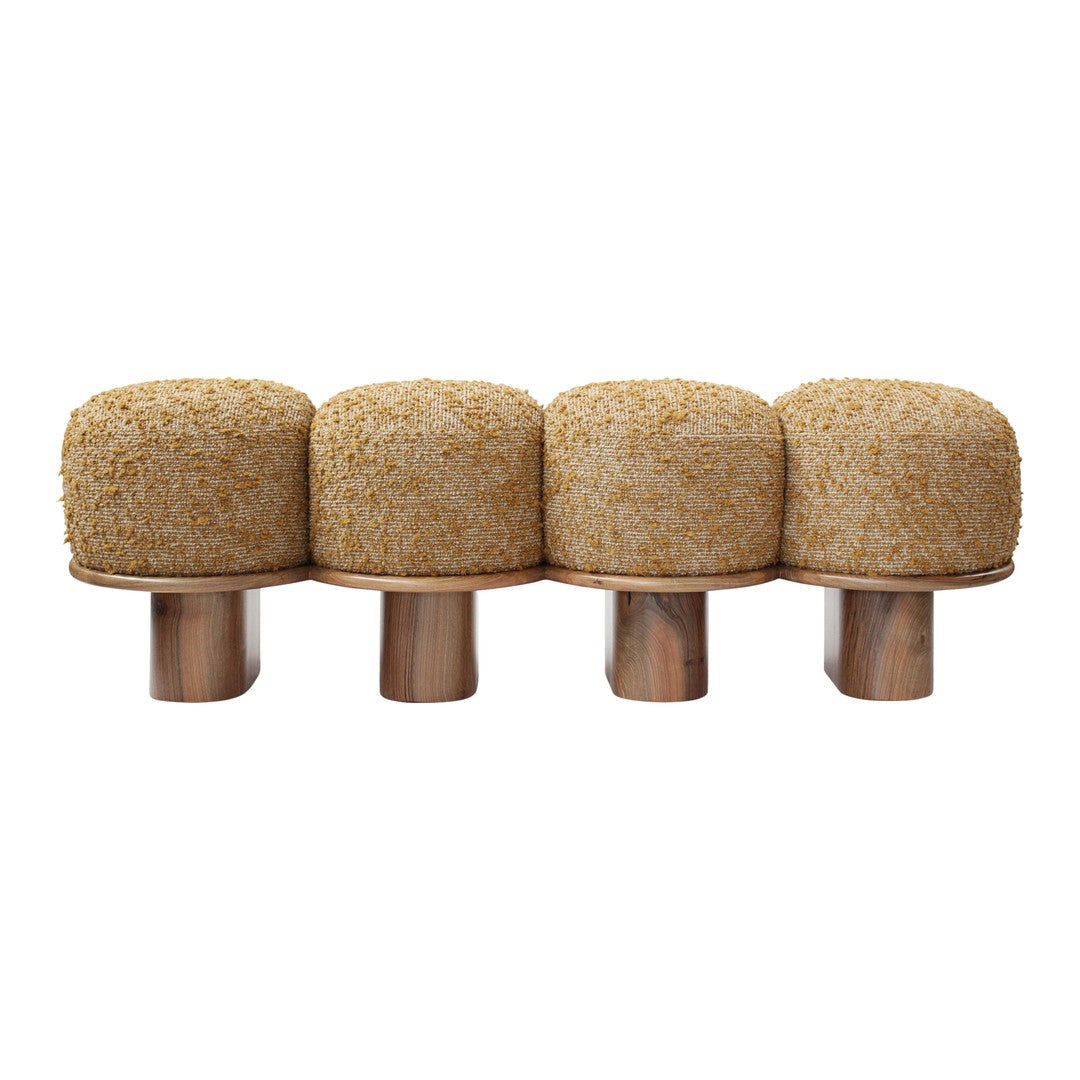 Set of four beige round textile poufs with a soft, textured surface on metallic bases.