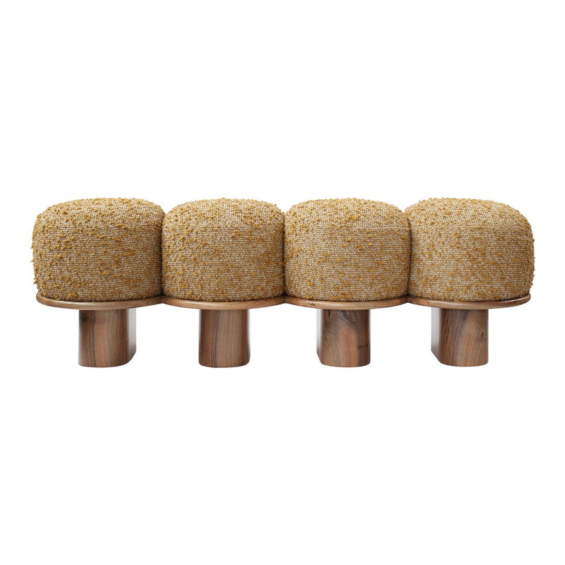 Set of four beige round textile poufs with a soft, textured surface on metallic bases.