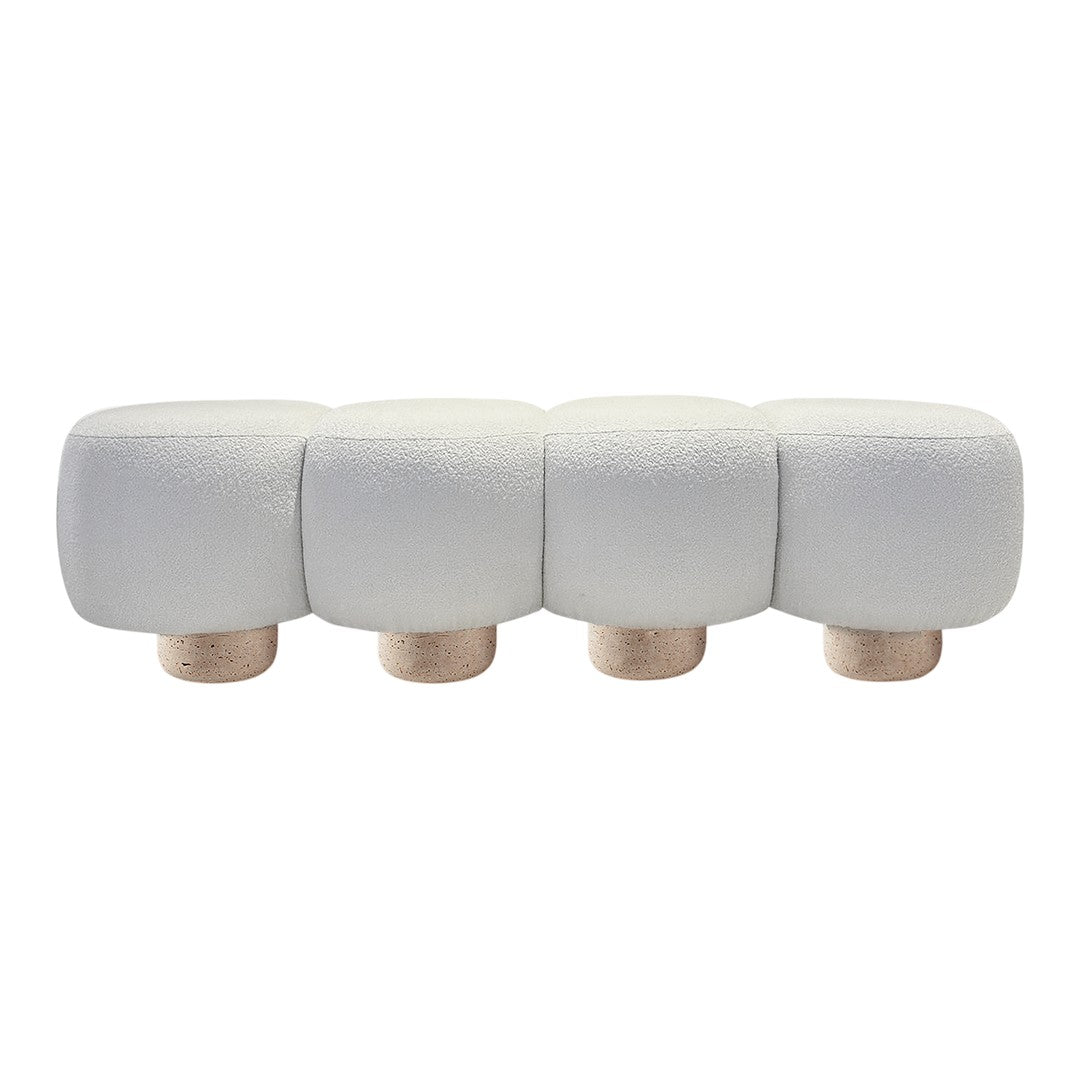 Soft white ottoman with textured fabric and natural wooden legs, featuring a modern, minimalist design.