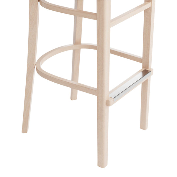 Light wood bar stool with smooth, natural finish and minimalistic design, featuring silver metal footrest.