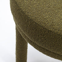 Olive green textured fabric stool with a soft, subtle pattern and sturdy legs. Perfect for modern decor.