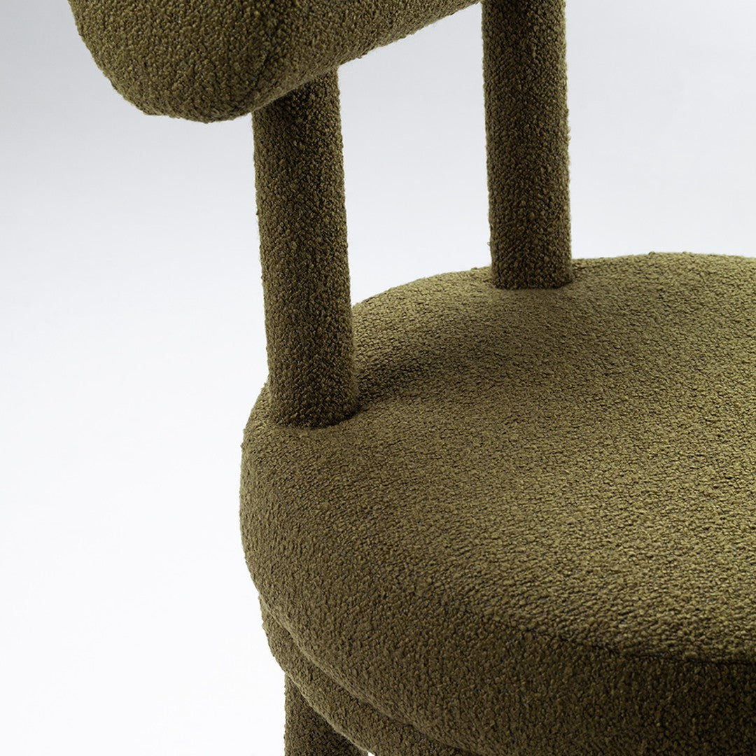 Olive green chair with a textured finish, featuring a soft, cozy pattern on the seat and backrest.