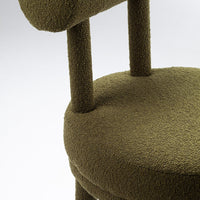 Olive green chair with a textured finish, featuring a soft, cozy pattern on the seat and backrest.