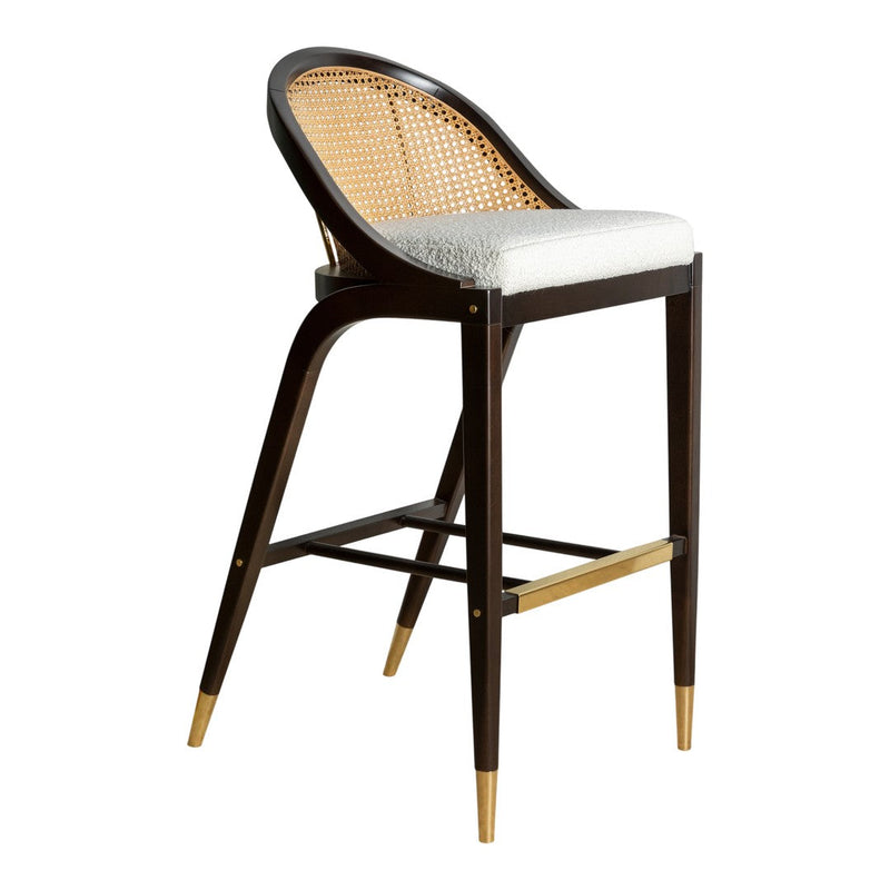 Brown rattan bar stool with white cushion and gold accents, featuring a sleek, modern design.