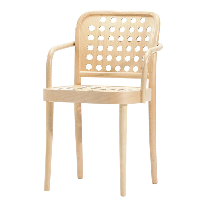 Light beige chair with a perforated design, featuring rounded edges and smooth wooden finish. Ideal for contemporary decor.
