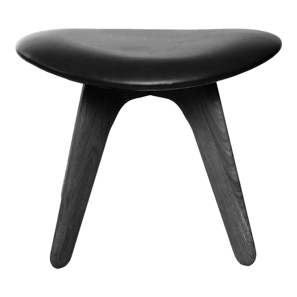 Black minimalist stool with a smooth surface and natural wooden legs in a sleek, modern design.