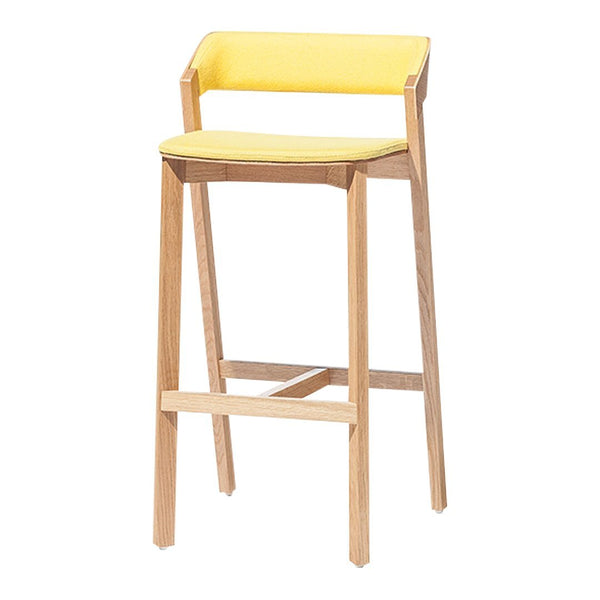 Yellow upholstered bar stool with natural wood legs, featuring a minimalist design and simple lines.