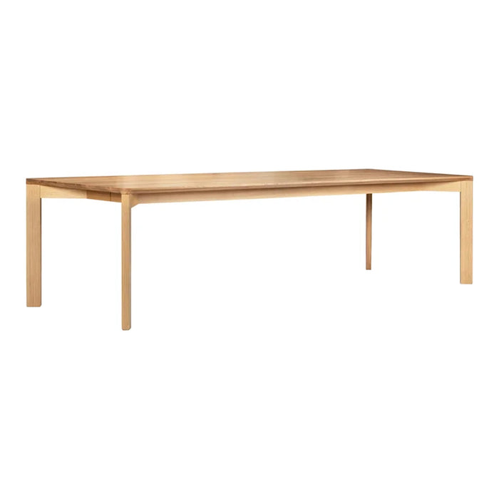 Light wood dining table with a smooth, natural finish and minimalist design, featuring clean lines and simple elegance.