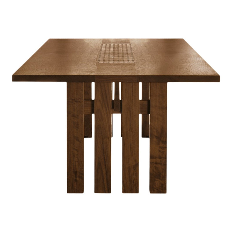 Wooden dining table featuring a rich brown finish and unique slatted pattern on the top.