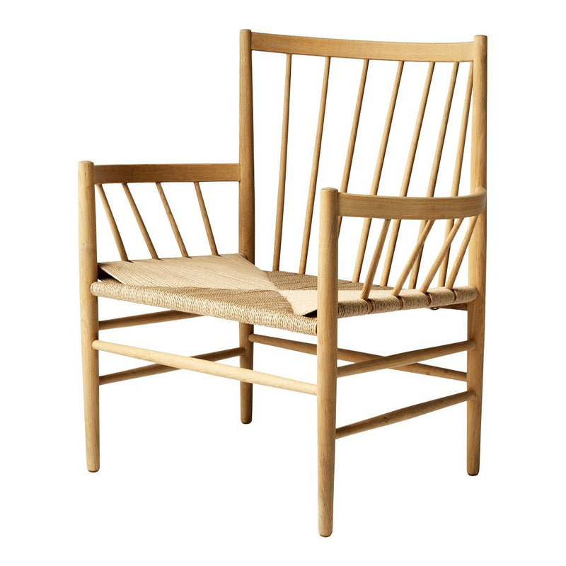 Natural wood chair with vertical slats and a woven seat in a light, sandy beige color.