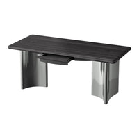 Modern black wood tabletop with sleek silver legs, featuring a minimalist design and subtle grain pattern.