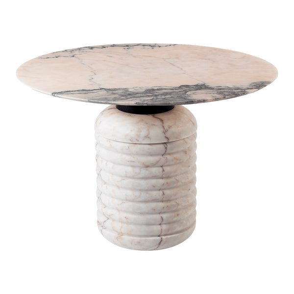"Round marble table featuring soft cream tones with gray veining and a textured cylindrical base."