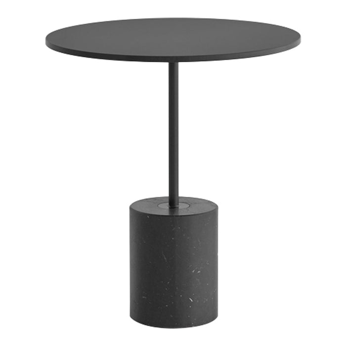 Black round table with a sleek circular top and a cylindrical base featuring a textured pattern. Perfect for modern decor.