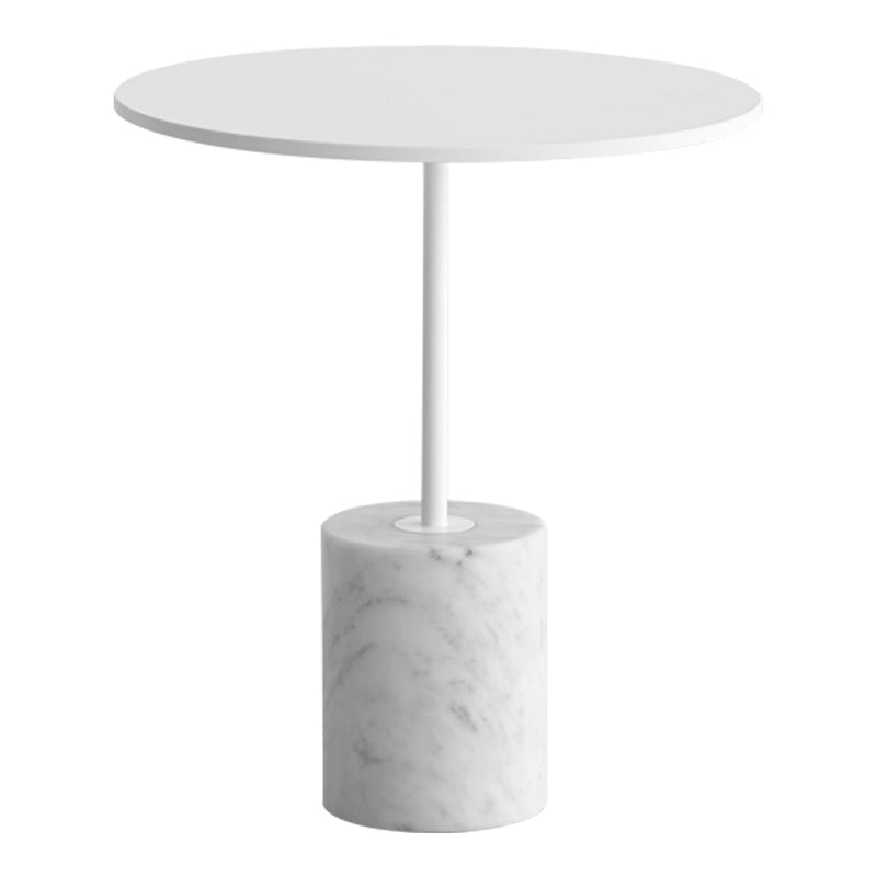 White round tabletop with a sleek white stem and a textured gray marble base. Modern minimalist design.
