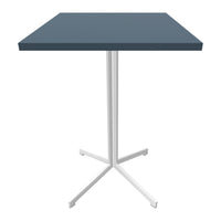 Modern square table with a dark blue top and sleek white legs, featuring a minimalist design for contemporary spaces.