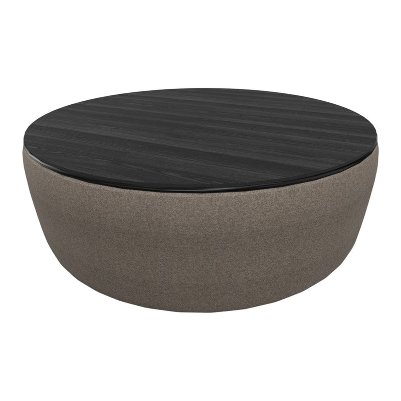 Round coffee table featuring a dark wood top and a soft, beige fabric base for a modern look.