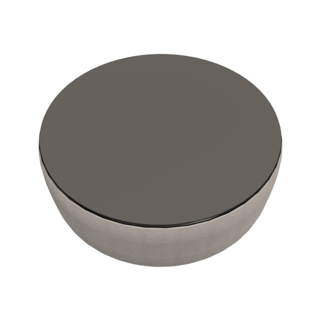 Round gray coffee table with a smooth surface and metallic finish, featuring a sleek minimalist design.