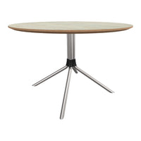 Round wooden table with a light oak finish, featuring a sleek silver metal tripod base and black accents.