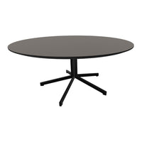 Round black dining table with a sleek, modern design and a smooth gray surface. Perfect for contemporary spaces.