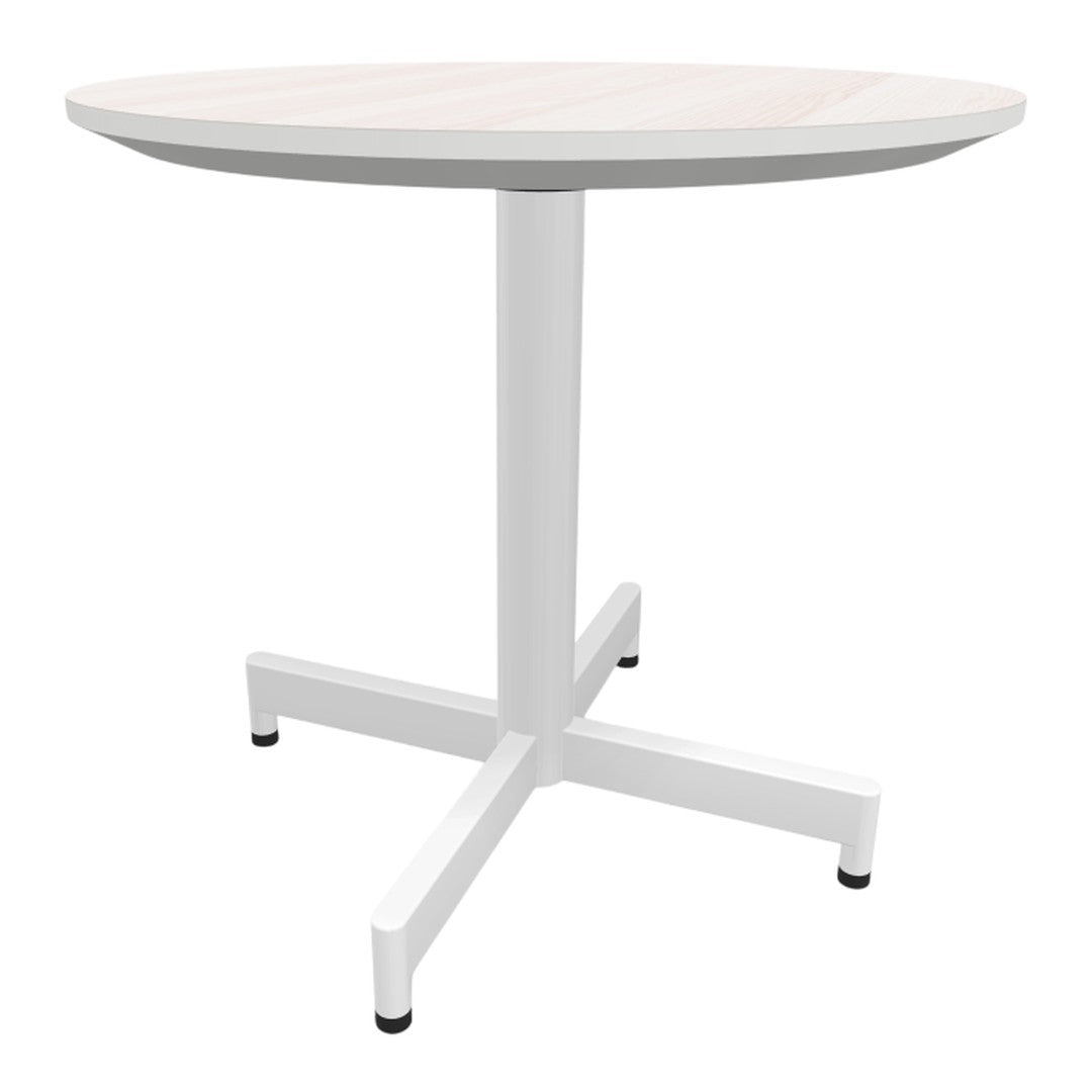 Round white dining table with a light wood top and minimalist design, featuring a sturdy white cross base.