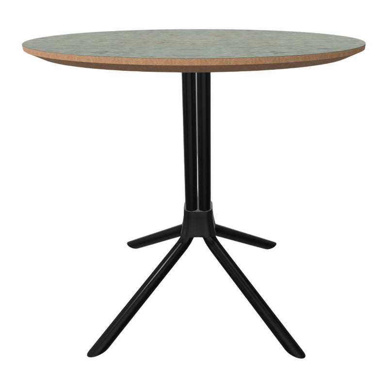 Round table with a greenish top and contrasting black base; minimalistic design with natural wood accents.
