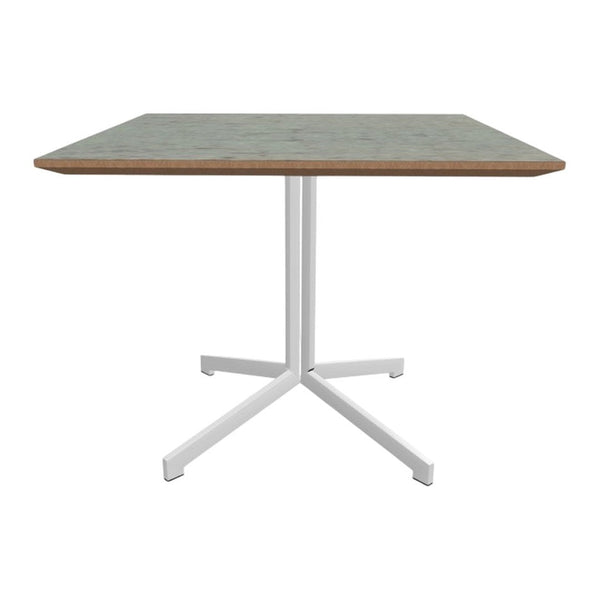 Square dining table with a light green patterned top and white metal legs, perfect for modern decor.