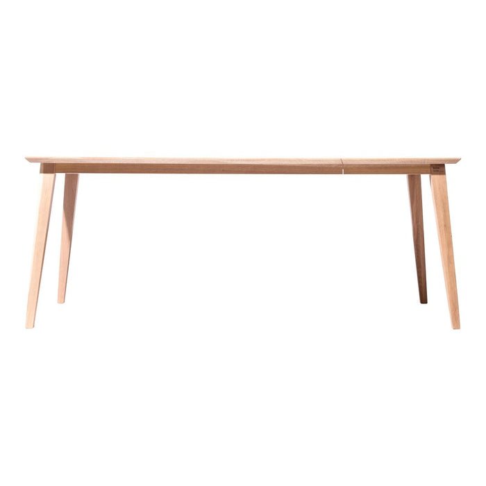 Light wood dining table with a smooth finish and tapered legs, featuring a minimalist design for modern decor.