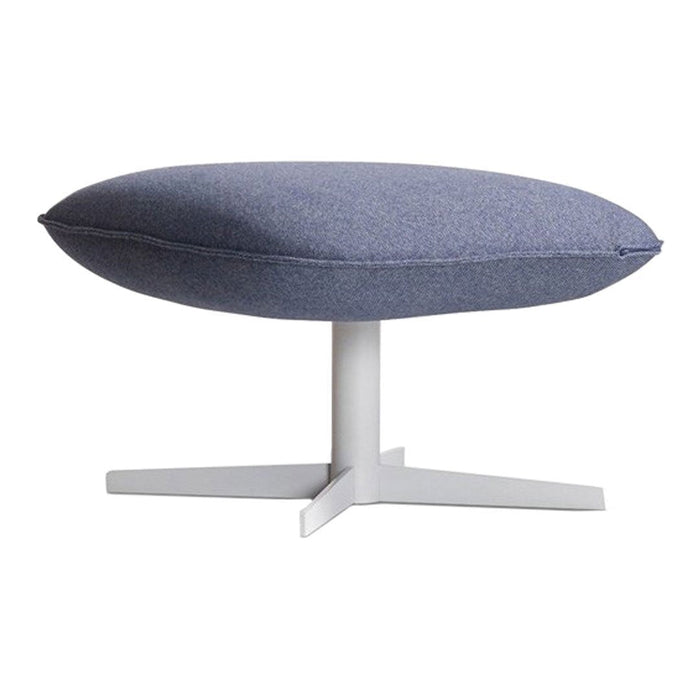 Round, blue upholstered stool with a textured fabric and a sleek white metal base. Modern design for any decor.