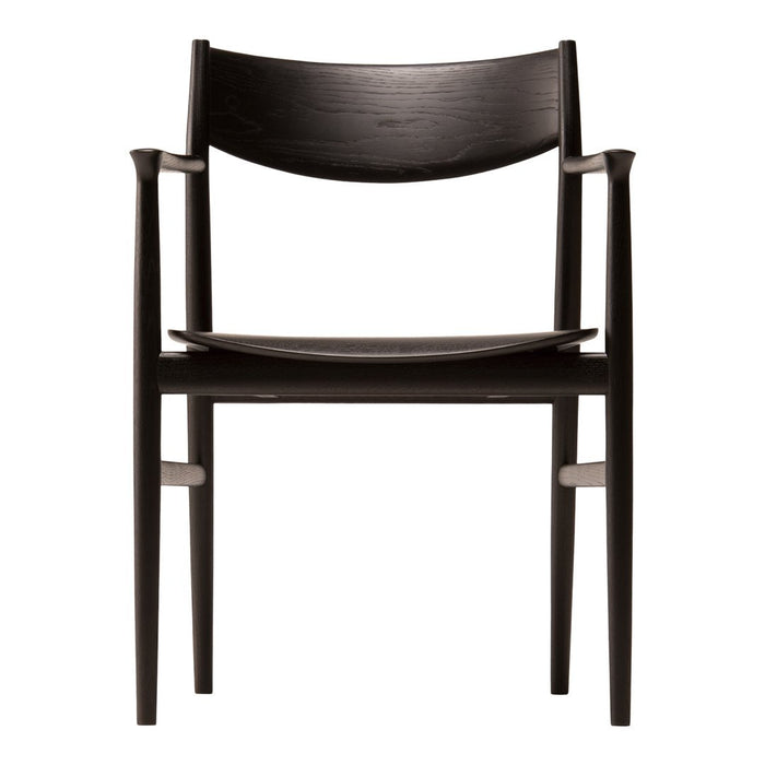 Modern black wooden chair featuring smooth lines and a minimalist design, ideal for contemporary interiors.