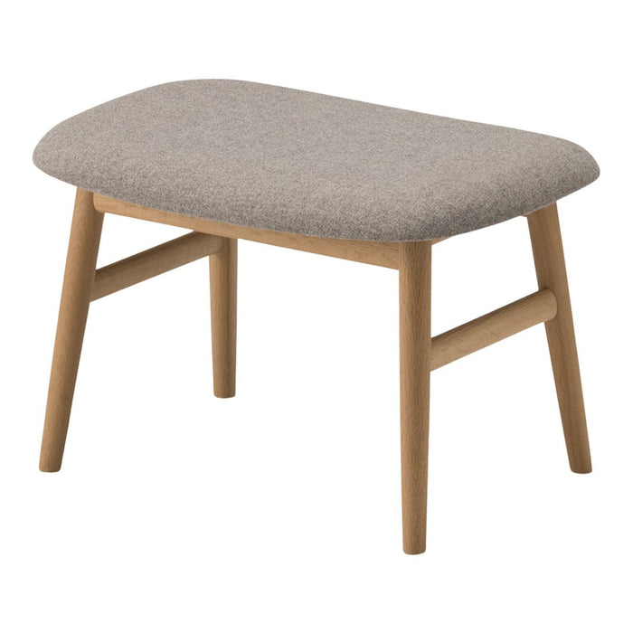 Gray upholstered ottoman with a smooth, rounded top and light wood legs, perfect for modern decor.