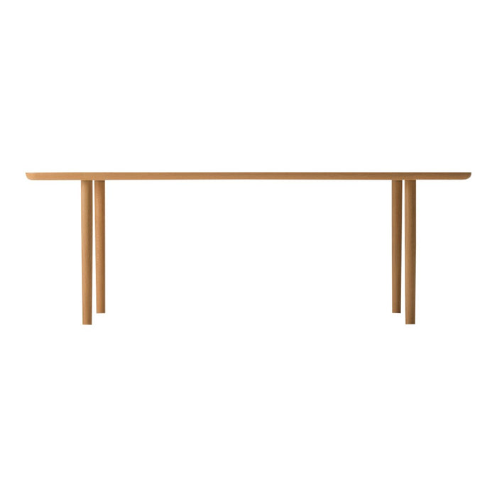 Light wood dining table with a smooth, natural finish and simple, modern design.