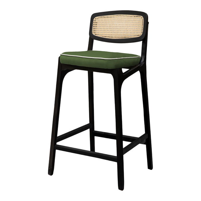 Black bar stool with a green cushion and woven rattan backrest, featuring natural textures and modern design elements.