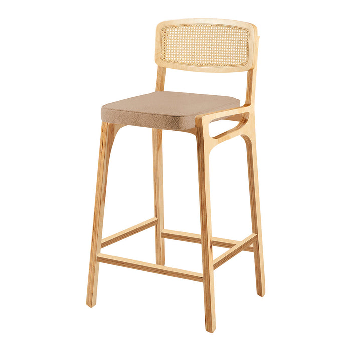 Wooden bar stool with a natural finish, featuring a beige fabric seat and cane backrest pattern.