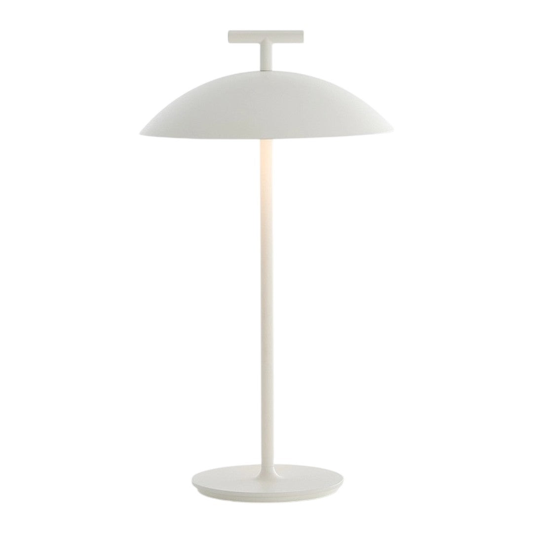 Modern white table lamp with a sleek dome shade and slim base, featuring a minimalist design and smooth finish.