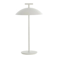 White minimalist lamp with a smooth dome shade and a sleek, slender base, perfect for modern interiors.
