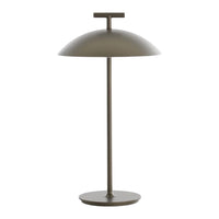 Sleek olive green lamp with a modern dome shade and minimalist design, perfect for contemporary decor.