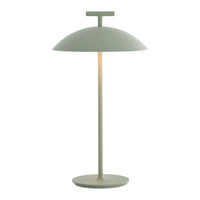 Minimalist lamp in soft sage green with a smooth, rounded shade and sleek base, perfect for modern decor.