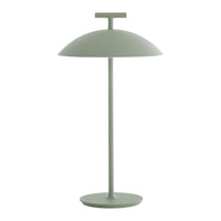 Green modern lamp with a sleek, minimalist design and smooth, rounded shade. Perfect for stylish decor.