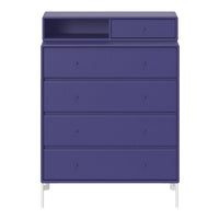 Vibrant purple dresser with four textured drawers and a minimalist design, featuring a contrasting white base.