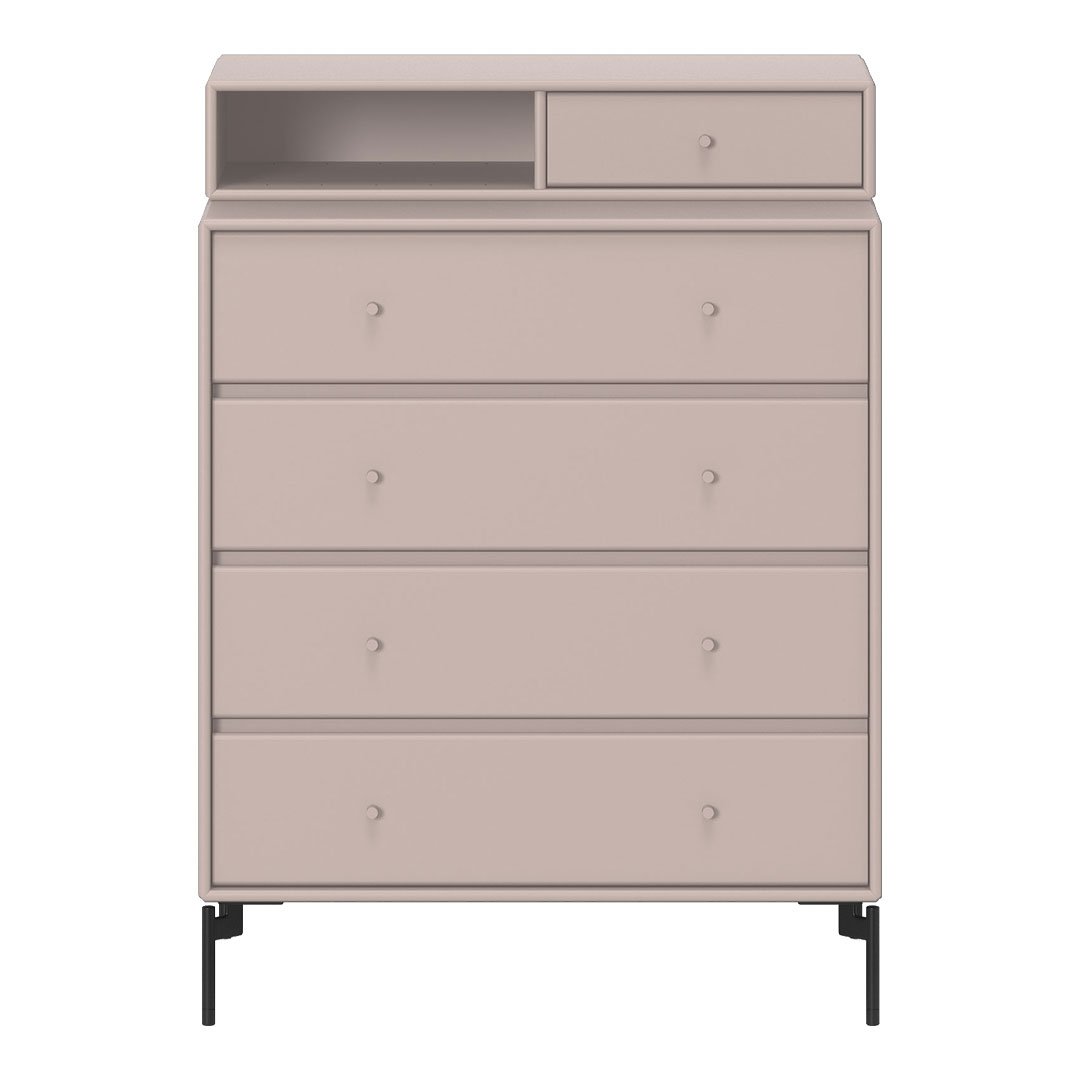 Blush pink dresser with a sleek design, featuring a smooth finish and minimalist black legs.