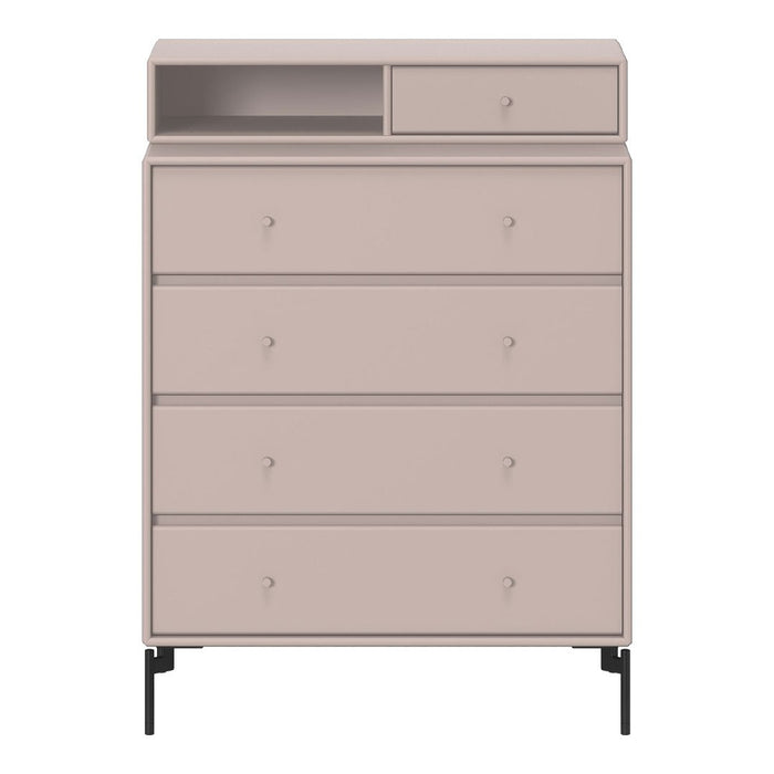 Blush pink dresser with a sleek design, featuring a smooth finish and minimalist black legs.