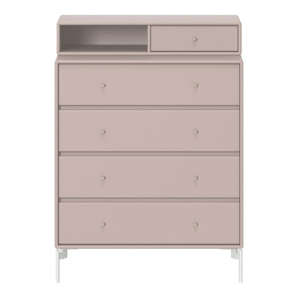 Blush pink dresser with minimalistic design, featuring smooth surfaces and sleek white accents. Perfect for modern interiors.