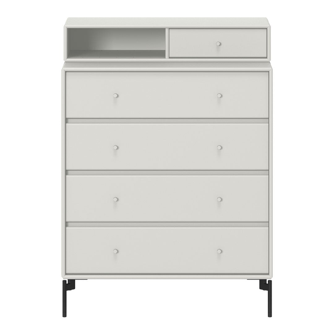 Light gray dresser with five drawers and a top shelf, featuring sleek black legs and minimalistic design.