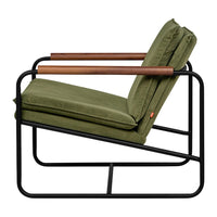 Olive green cushioned chair with sleek black metal frame and wooden armrests, emphasizing modern style and comfort.