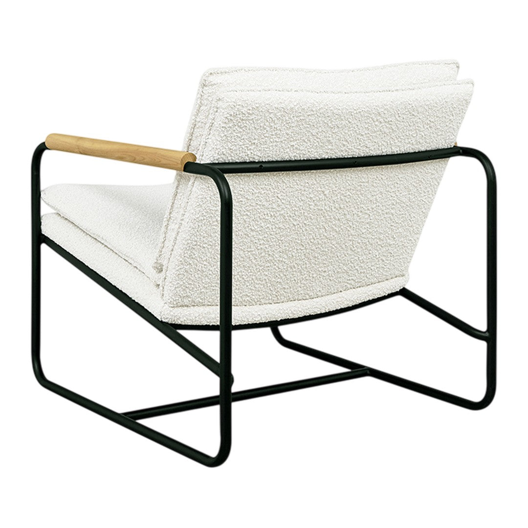 Cream-colored chair with a textured surface, featuring a sleek black metal frame and natural wood accents.
