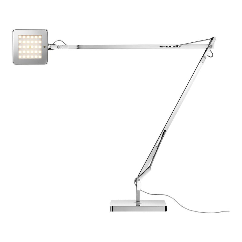 Sleek chrome desk lamp with a minimalist square design and illuminated grid panel, perfect for modern decor.