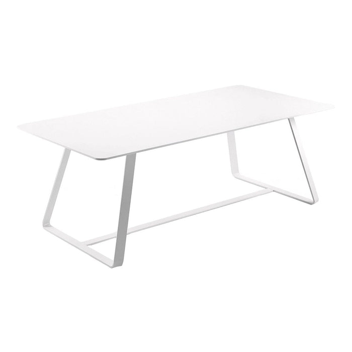 White rectangular table with a sleek, minimalist design and a smooth surface, paired with angular white metal legs.