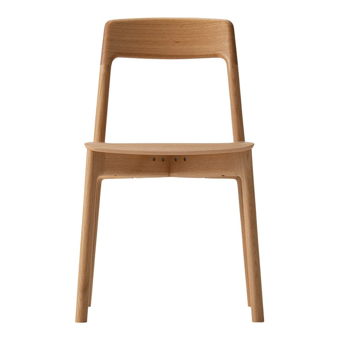 Natural wood chair with a clean, minimalist design featuring a light oak finish and smooth, unadorned surfaces.