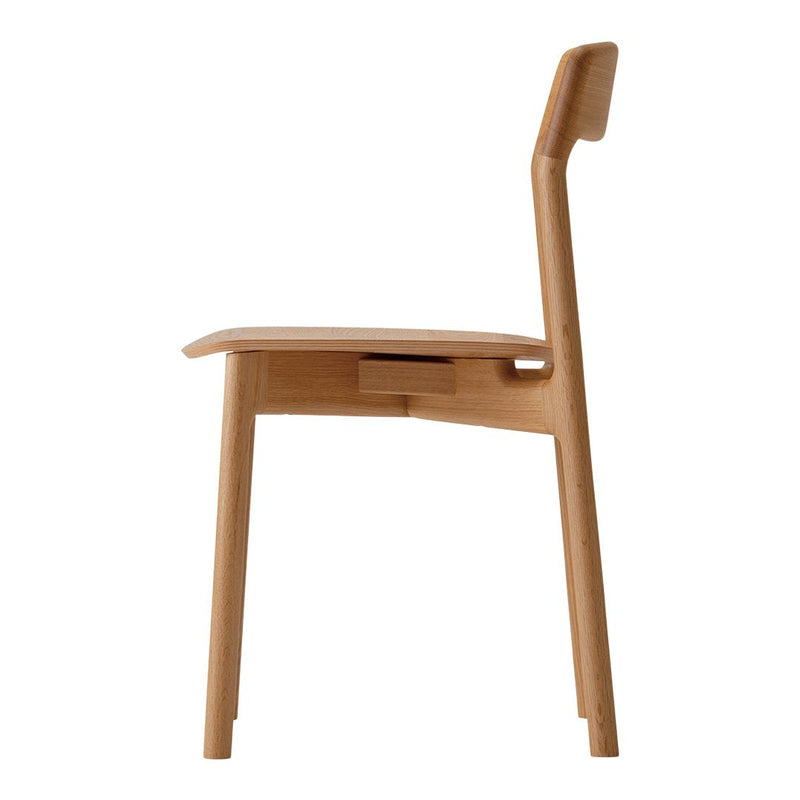 Light wood chair with a smooth, natural finish and sleek, minimalist design. Perfect for modern decor.